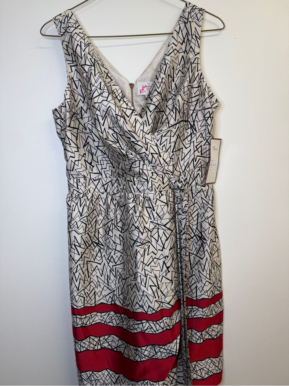 CeCe Cream and Black Abstract Midi Dress with Red Stripe Hem